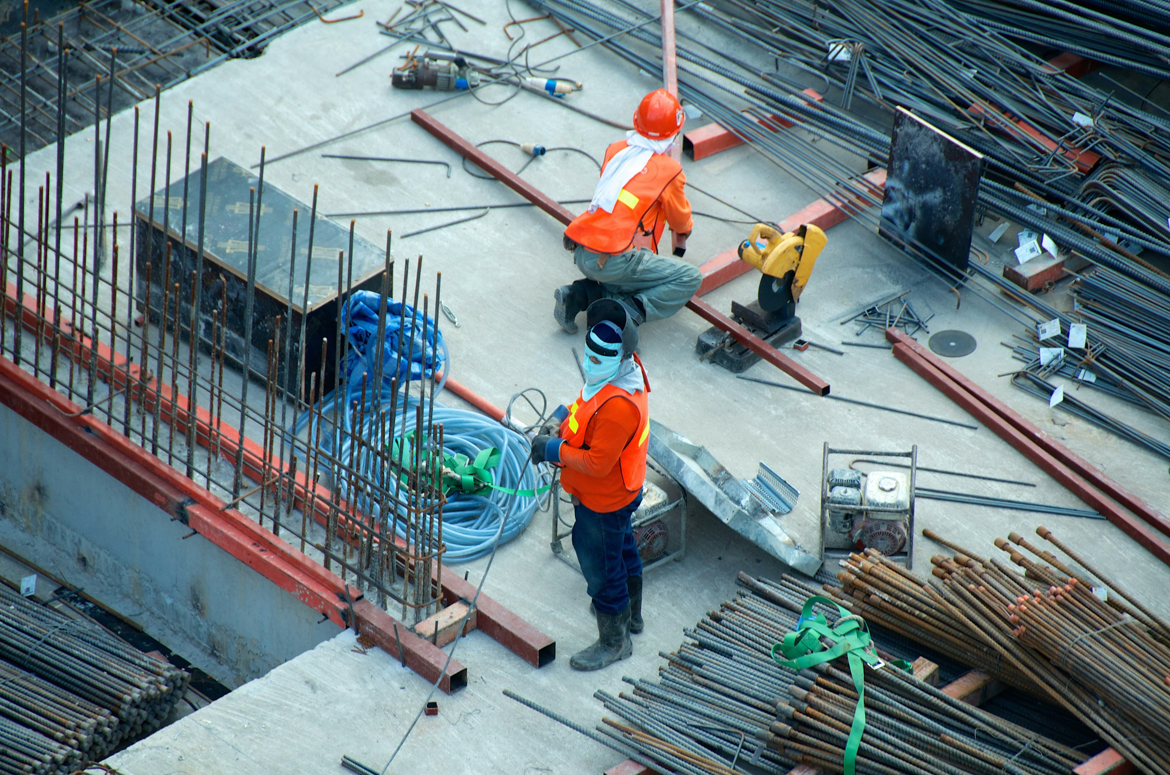 Builders at work, illustrative stock photo