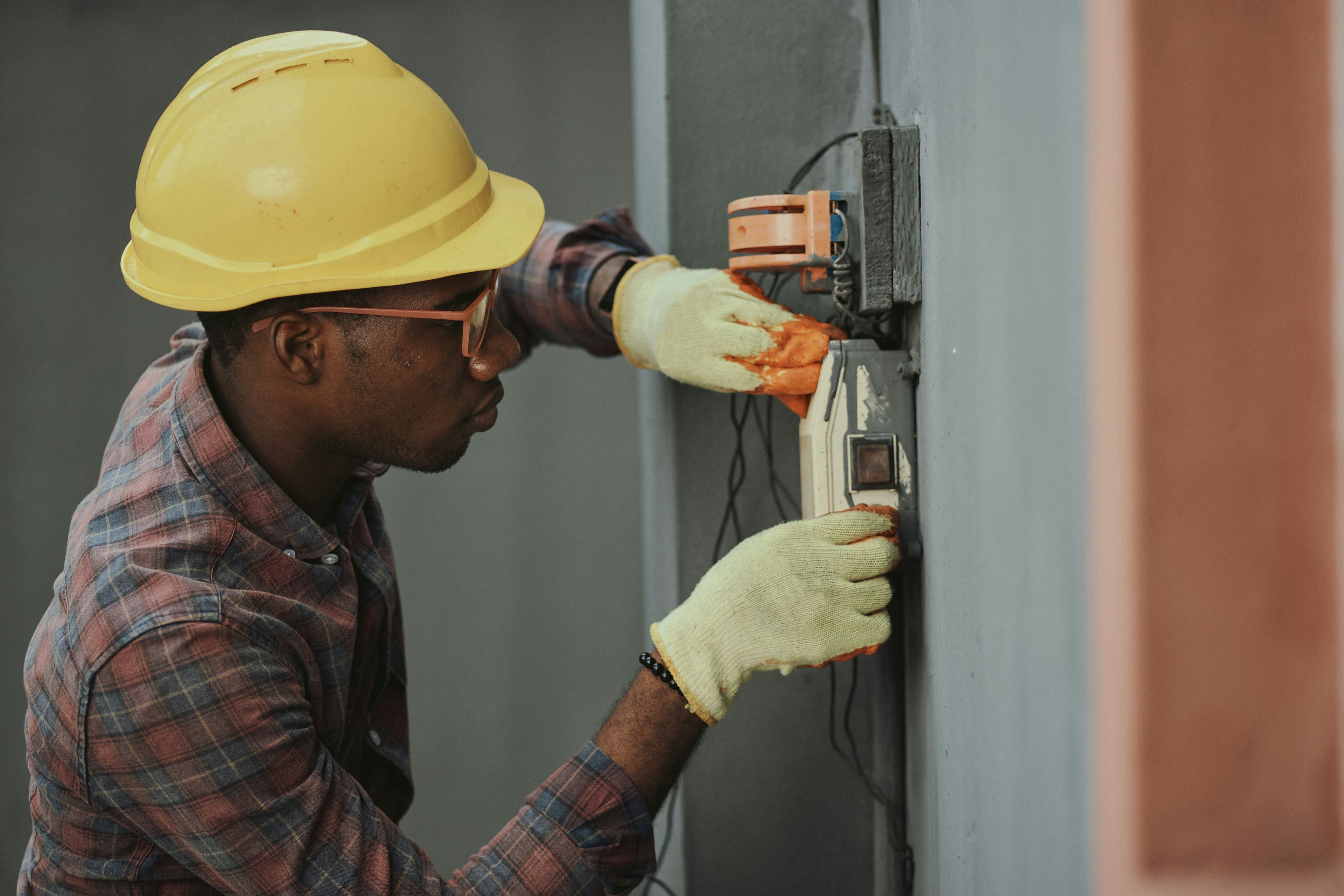 Electricians at work, illustrative stock photo